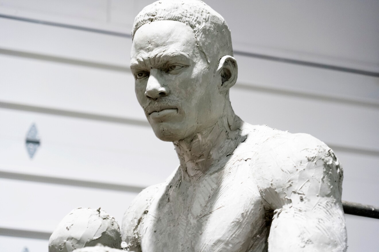 An image of the clay sculpture of Ezzard Charles created by artist John Hebenstreit.